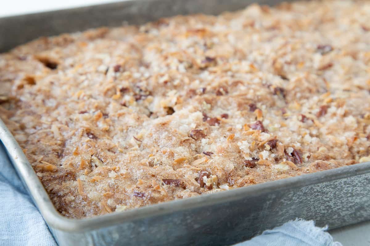 freshly baked rhubarb cake in a metal pan.