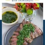 skirt steak on a gray plate, topped with chimichurri.
