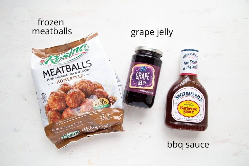 ingredients for crockpot meatballs on a white table.