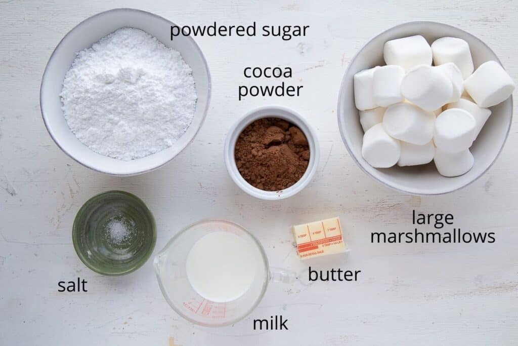 topping ingredients for marshmallow cookies on a white table.