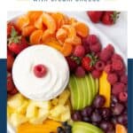 platter of fresh fruit with a bowl of fruit dip.