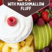 platter of fruit with a fluffy white marshmallow fluff dip in a bowl in the center.