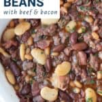 calico beans in a rectangular white dish.