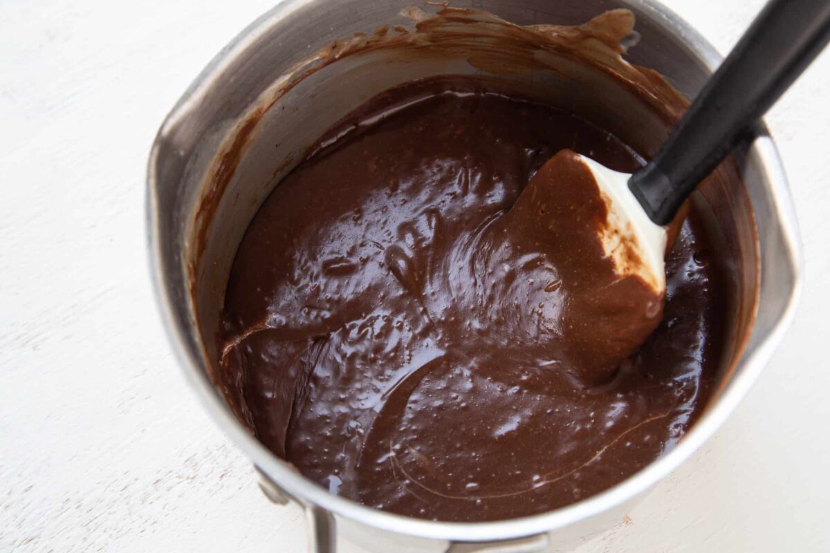 marshmallow fudge in a saucepan with a spatula.