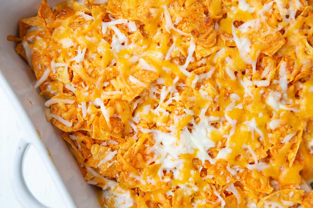 cooked Dorito chicken casserole topped with melted cheese.