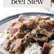 beef stew on top of rice.