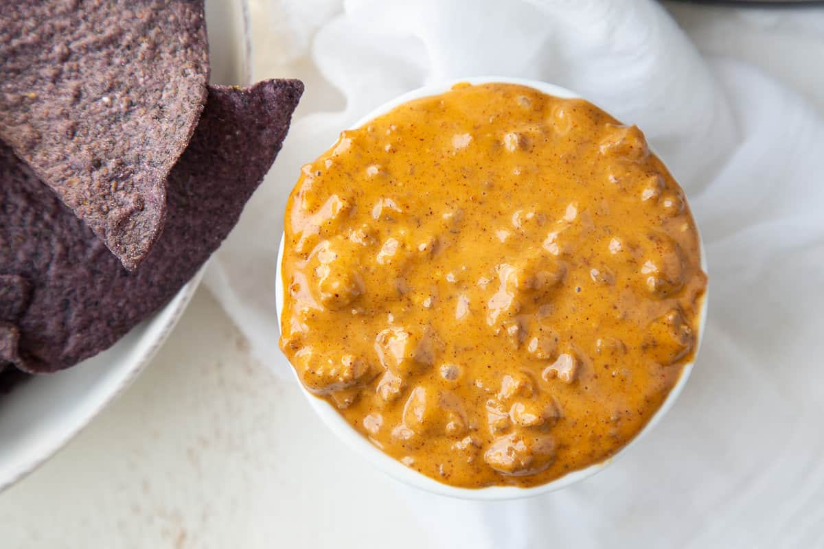 chili cheese dip in a white ramekin.