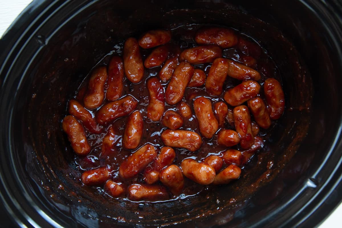 uncooked cocktail weiners in a crockpot.