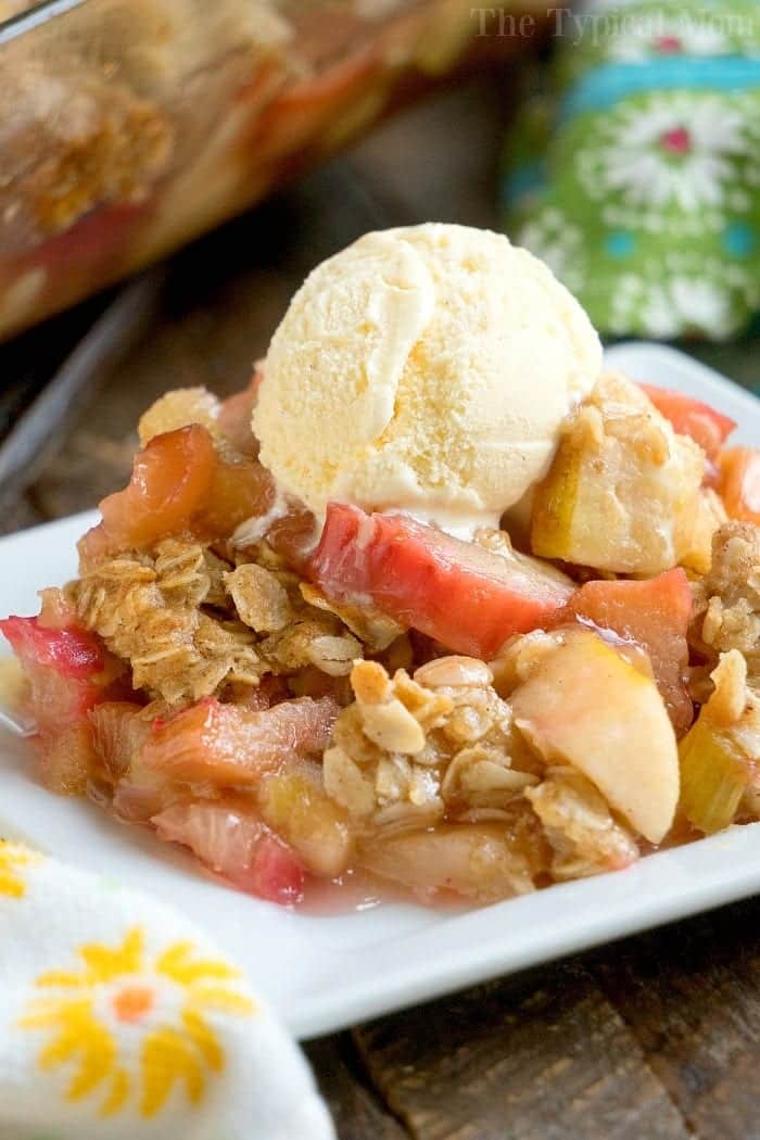 rhubarb crunch topped with a scoop of vanilla ice cream.