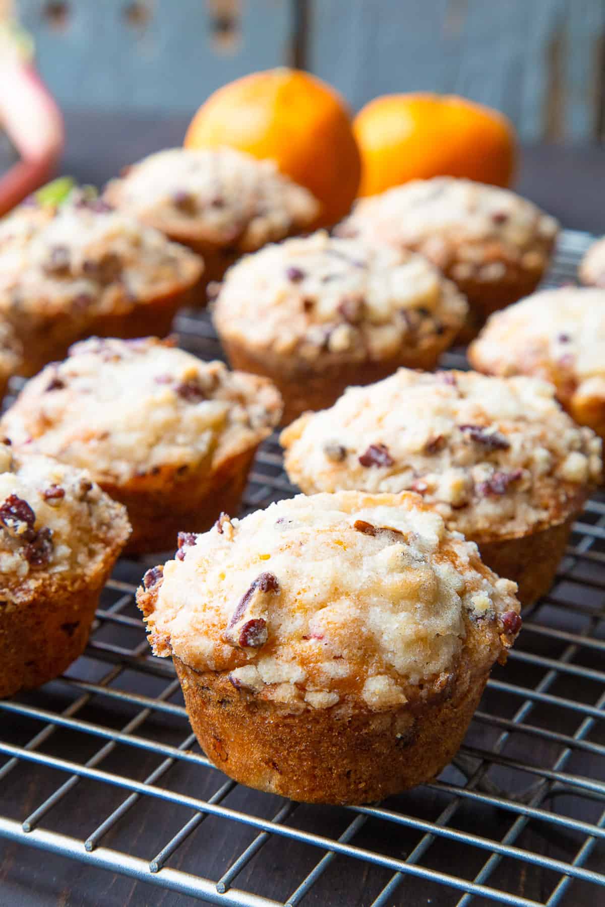 rhubarb muffins on a wire cooling rack.