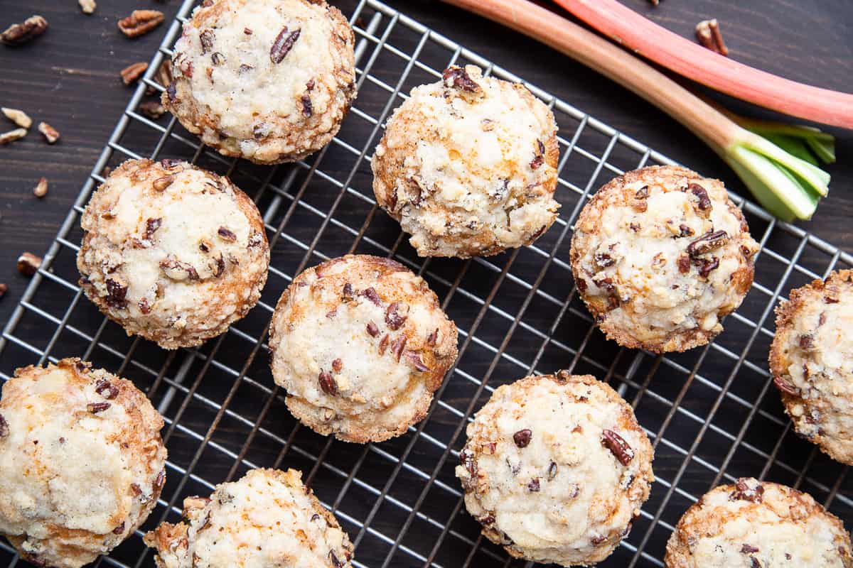 rhubarb muffins on a wire cooling rack.