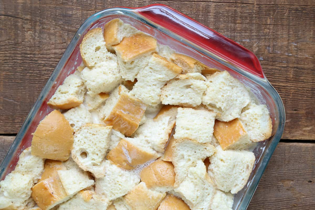 unbaked french toast casserole in a glass dish.
