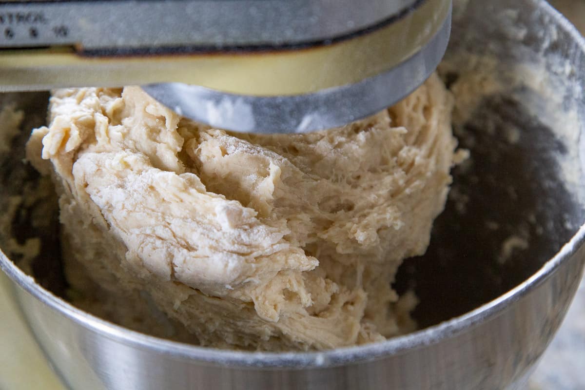 bread dough in a stand mixer bowl.