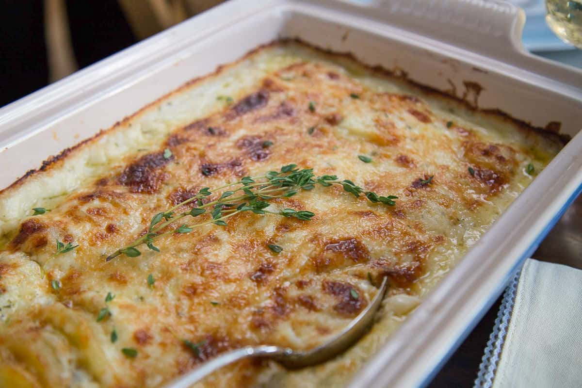 gruyere scalloped potatoes topped with fresh thyme.