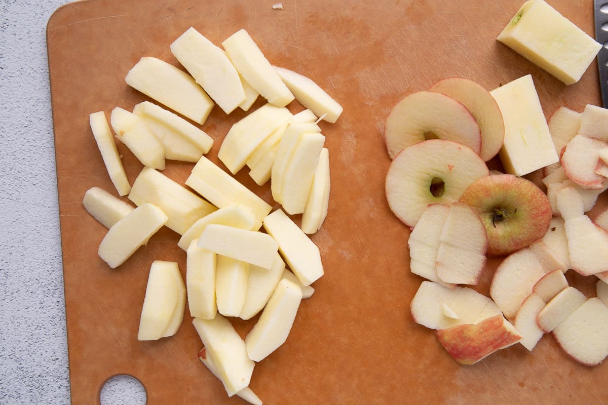 sliced apples on a cutting board.