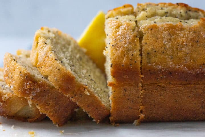 slices of lemon poppy seed loaf falling over.