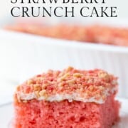 slice of strawberry crunch cake on a white plate.