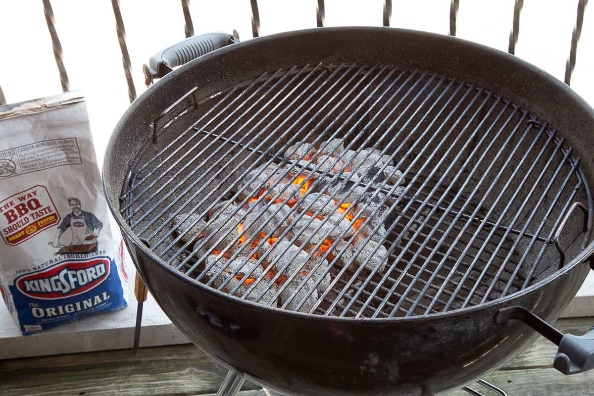 charcoal grill with charcoal coals on one side only to create a two zone fire.