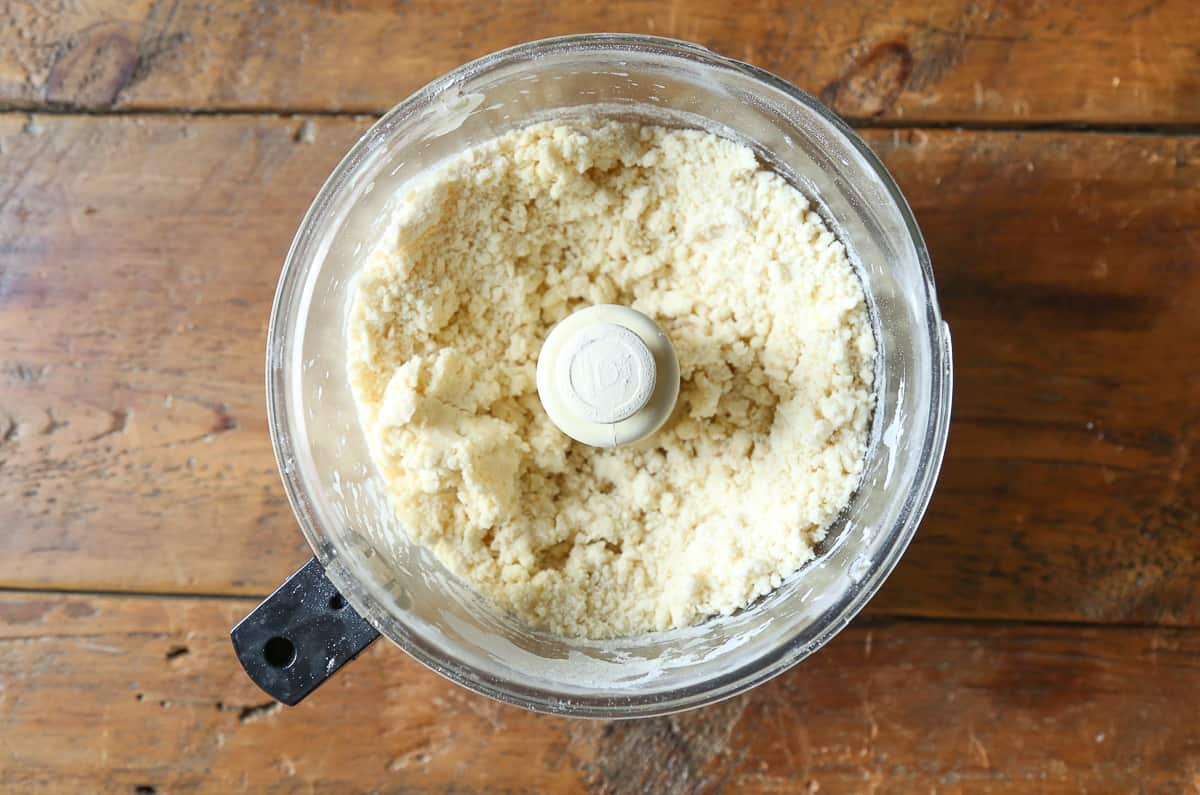 crumbly pie dough in a food processor.
