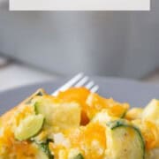 slice of zucchini casserole on a gray plate.