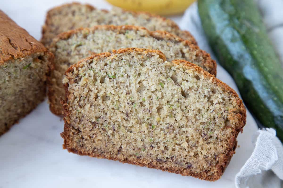 three slices of the inside of zucchini banana bread.