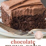 slice of chocolate mayo cake with a bite taken out, next to a fork.