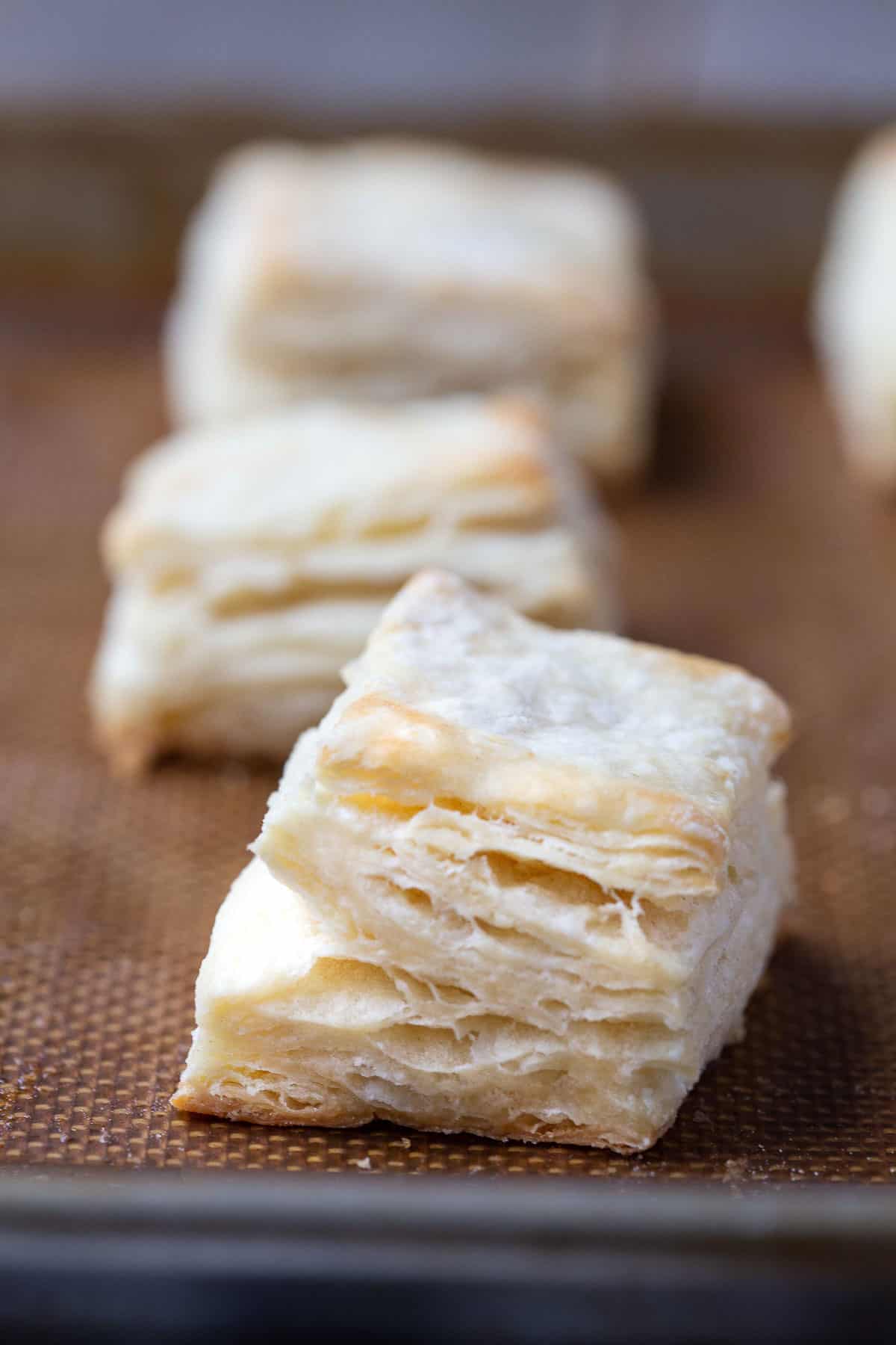 flaky biscuit on a baking sheet.