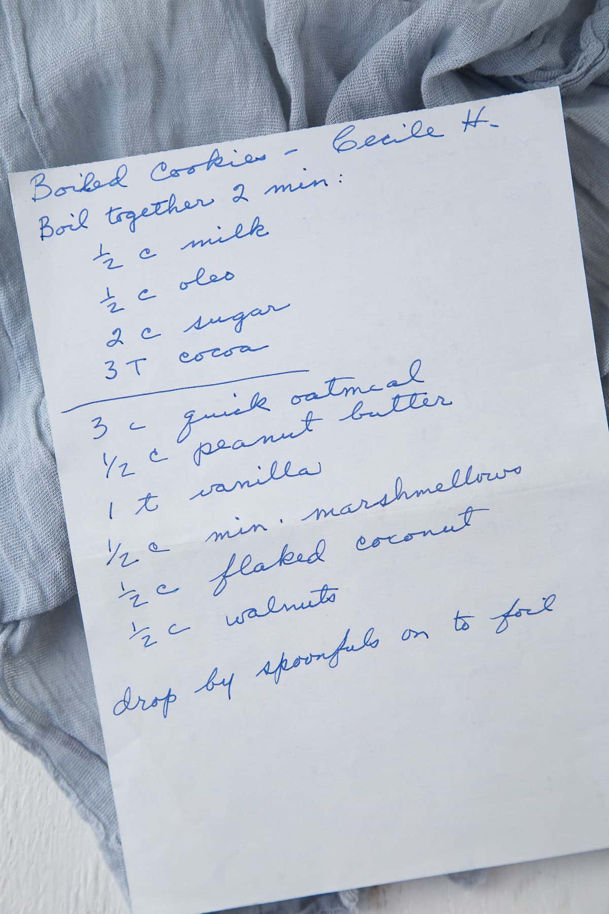 handwritten recipe for boiled cookies on white paper.