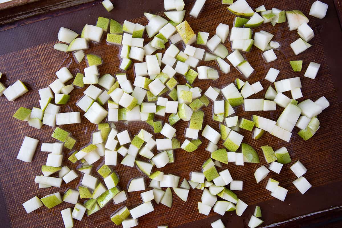 chopped pears on a baking sheet. 