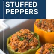 stuffed peppers in a gray casserole dish.