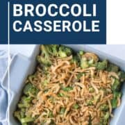 broccoli casserole topped with fried onions in a gray casserole dish.