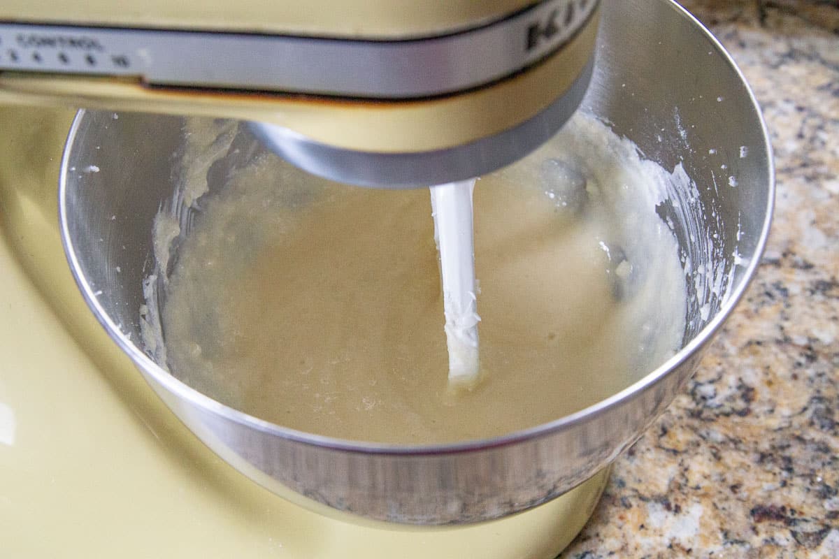 soft cookie batter in the metal bowl of a stand mixer.