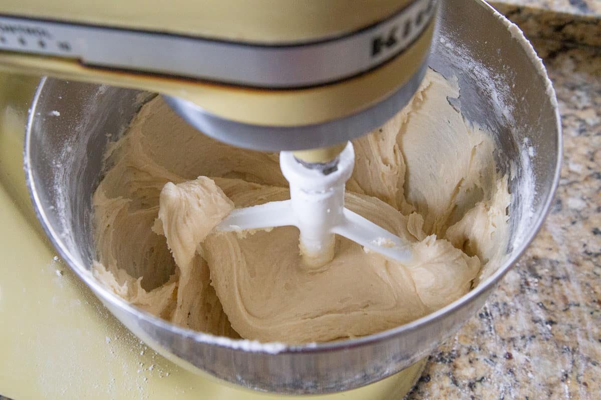sour cream cookie batter in a stand mixer.