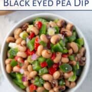black eyed pea dip in a small round white bowl.