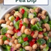 black eyed pea dip in a small round white bowl.