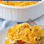 slice of hash brown casserole topped with corn flakes on a white plate.