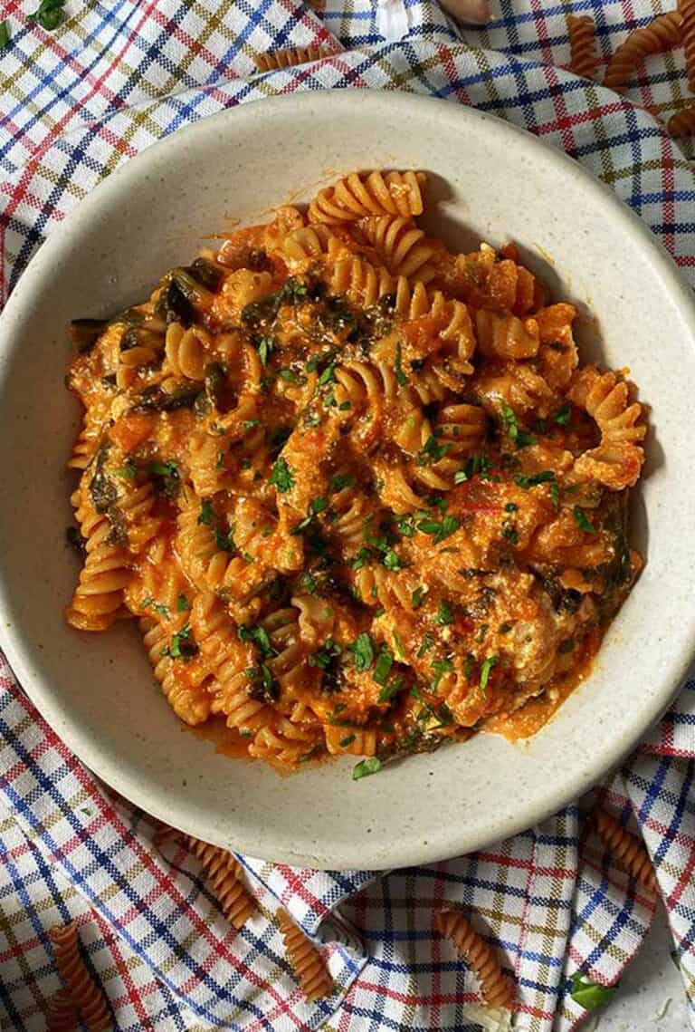 baked ziti in a white round bowl.