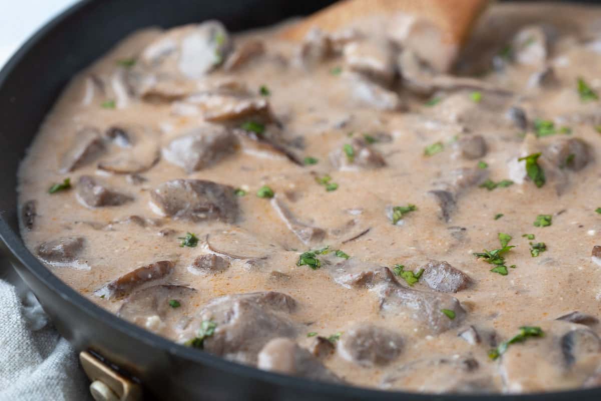 creamy beef stroganoff with mushrooms in a large skillet.