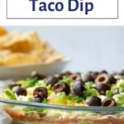 7 layer taco dip in a glass pie dish.