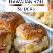 hawaiian roll sliders with ham and cheese on two white platters.