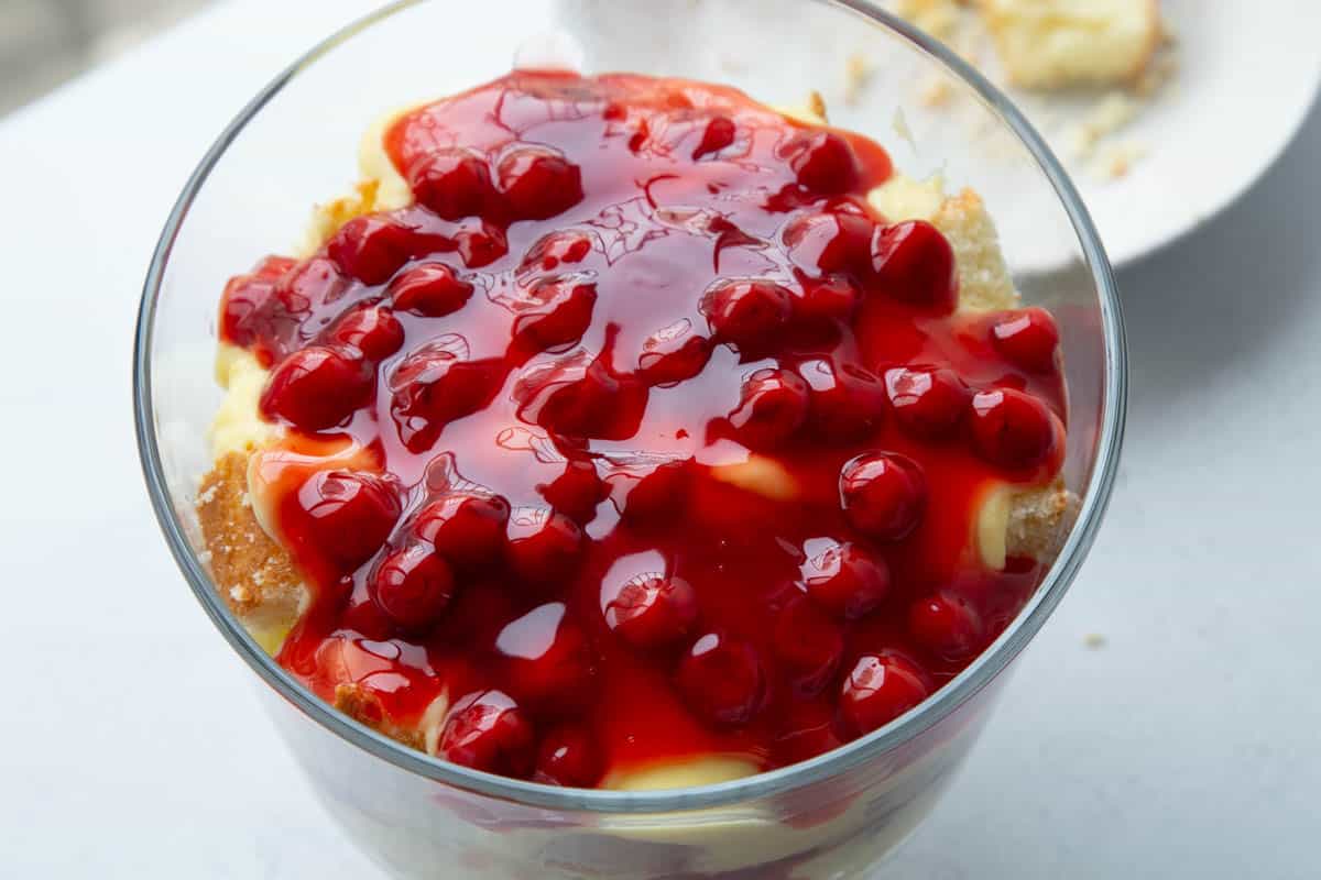 cherry pie filling layered in a trifle dish.