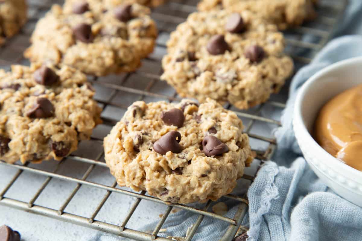 peanut butter oatmeal cookies on a wire rack.