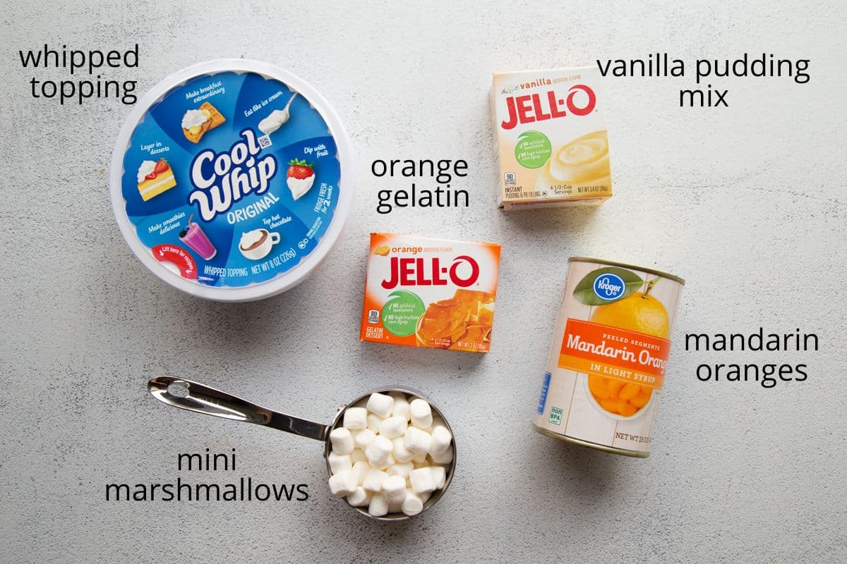 cool whip, mandarin oranges, orange jello, vanilla pudding mix, and marshmallows. 