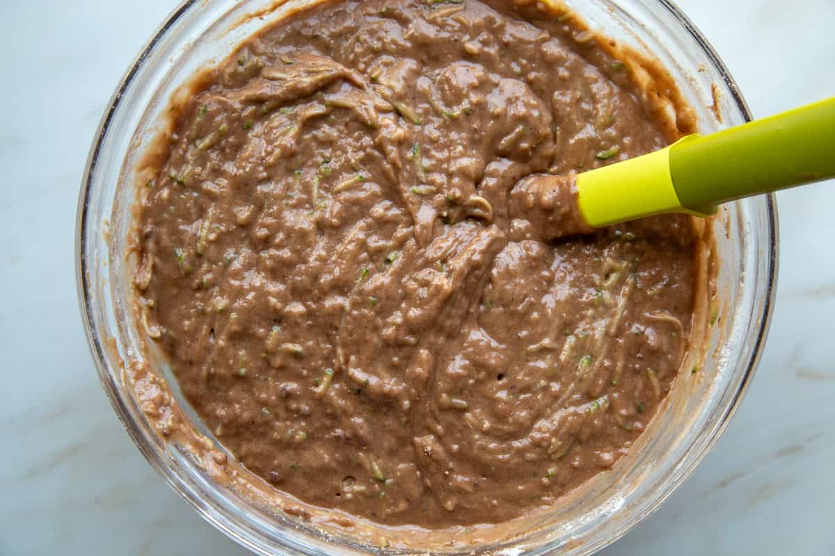 bowl of chocolate cake batter in a glass bowl.