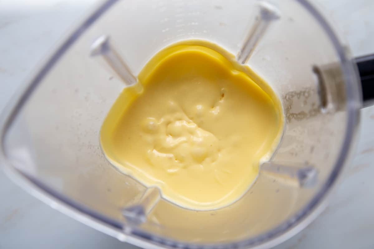 creamy yellow liquid in a blender.