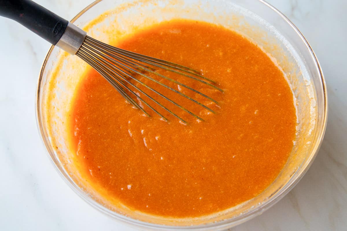 pumpkin and sugar mixture in a glass bowl.