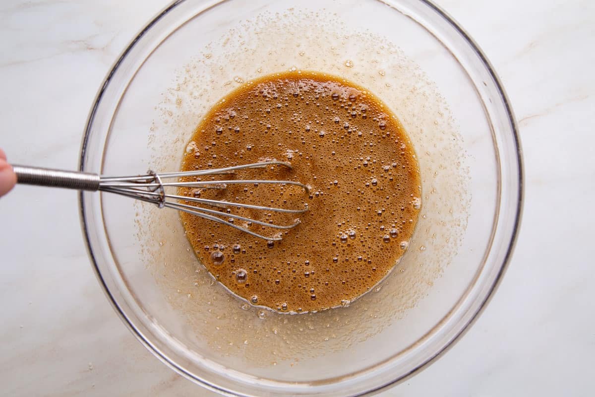 egg and sugar mixture in a glass bowl.