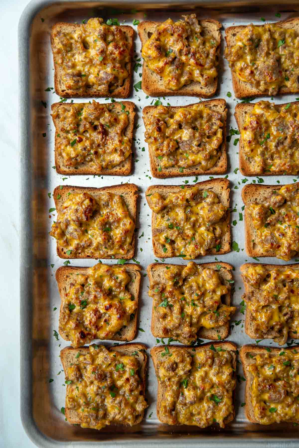 15 hanky panky appetizers on a baking sheet.