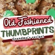 rows of round cookies with chopped pecans on the outside and a thumbprint indentation in the middle filled with pink and green icing.