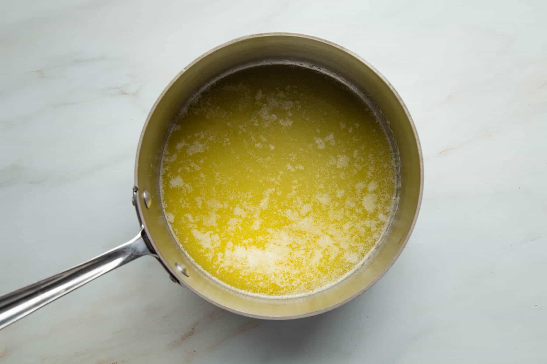 butter and sugar in a saucepan